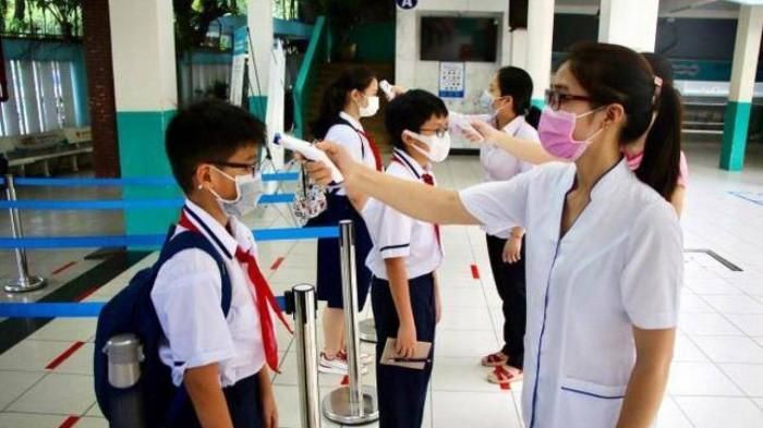 Bộ Y tế yêu cầu không bắt buộc xét nghiệm Covid-19 học sinh trở lại trường